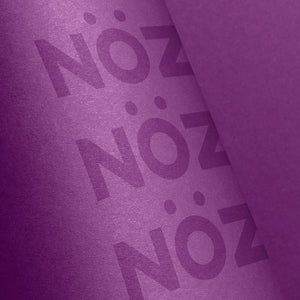 Nöz Closeup of purple sunscreen